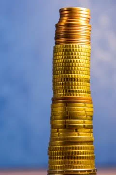 Stack of euro coins in a blue background Stock Photos