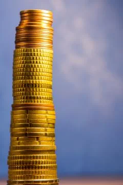 Stack of euro coins in a blue background Stock Photos
