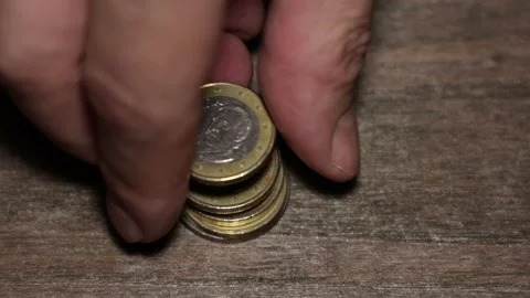 Stack of Euro coins on wood table 库存影片 161943722