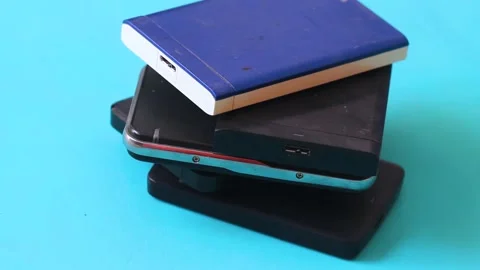 Stack of external hard drives. portable hard disk isolated. data storage Stock Footage 149309569