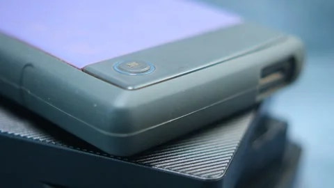 Stack of external hard drives on table  Stock Footage 297339593