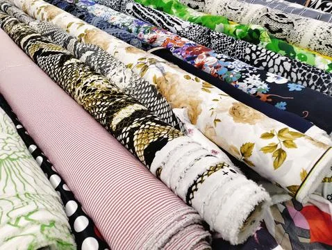Stack of Fabric Rolls in market Foto stock