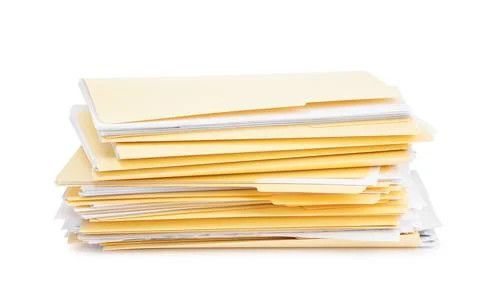 Stack of file folders with papers isolated on white 写真素材