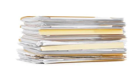 Stack of file folders with papers isolated on white 스톡 사진