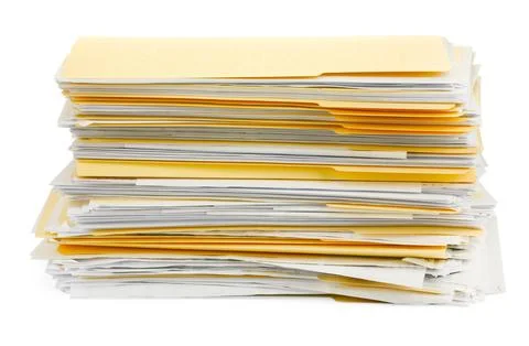 Stack of file folders with papers isolated on white Stock Photos
