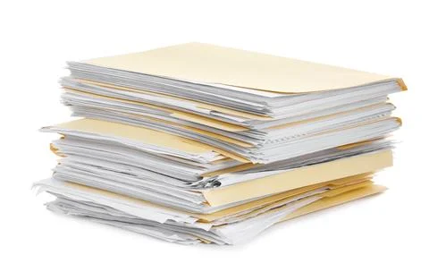 Stack of file folders with papers isolated on white Stock Photos