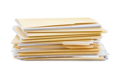 Stack of file folders with papers isolated on white Stock Photos