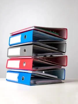 Stack of files on white background Stock Photos