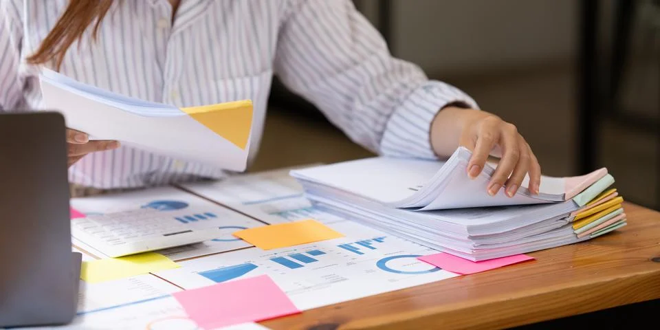 Stack of financial report paper documents for business desk, Business papers for Stock Photos