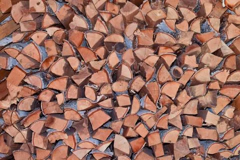 Stack of firewood in barn for winter texture Stock Photos