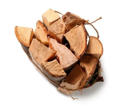 Stack of firewood logs tied with rope on white background Stock Photos