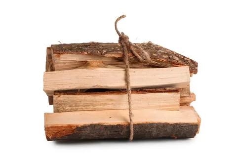 Stack of firewood logs tied with rope on white background Fotos de archivo