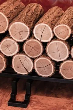 Stack of firewood sawn clean clean close up cracked rings background Stock Photos