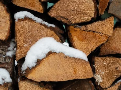 Stack of firewood in winter Stock Photos