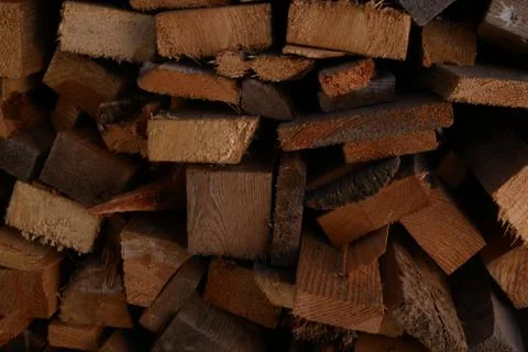 A stack of firewood in the woodshed Stock Photos