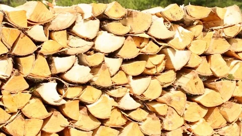 Stack of firewood in the yard Vídeo Stock 79670107