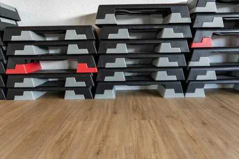 Stack of fitness stepper in front of white background with wooden oak floor i Stock Photos