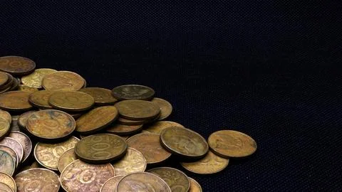 Stack of five hundred rupiah yellow Indonesian coins Stock Photos