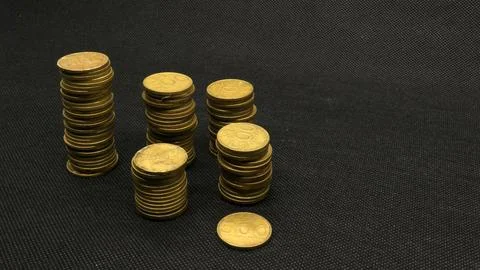 Stack of five hundred rupiah yellow Indonesian coins Stock Photos