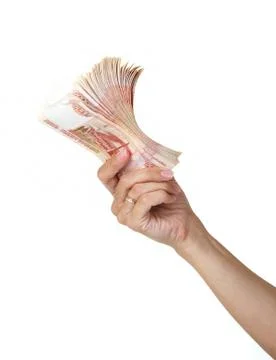 Stack of five thousandth bills in the female hand. Stock Photos