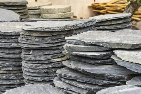 Stack flat slate stones cladding of wall used for flooring, walkways or wal.. Stock Photos