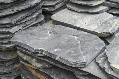 Stack flat slate stones cladding of wall used for flooring, walkways or wal.. Stock Photos