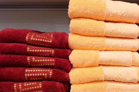 A stack of fluffy colored towels in close-up Stock Photos