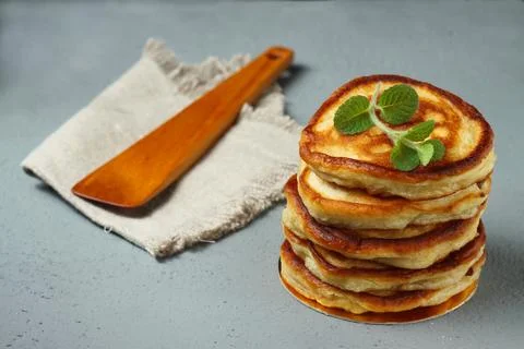 Stack of Fluffy Pancakes with Mint Stock Photos
