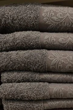 A stack of fluffy towels in close-up Stock Photos