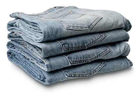 Stack of folded aged blue denim jeans Stock Photos