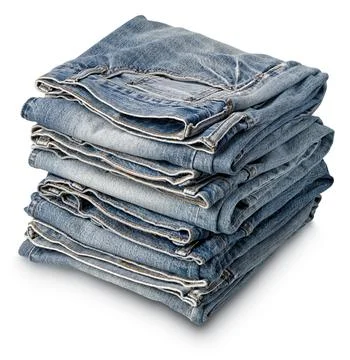 Stack of folded aged blue denim jeans Stock Photos