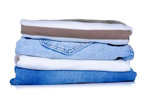 Stack folded cloth jeans sweaters Stock Photos