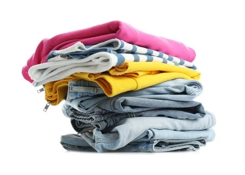 Stack of folded clothes isolated on white 스톡 사진