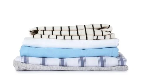 Stack of folded clothes on white background 스톡 사진