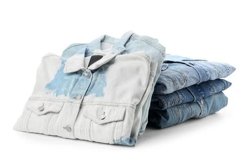 Stack of folded denim jackets and jeans, casual fashion and clothing retail c Foto stock