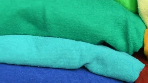 Stack of folded fabric in different colors Stock Footage 161092345
