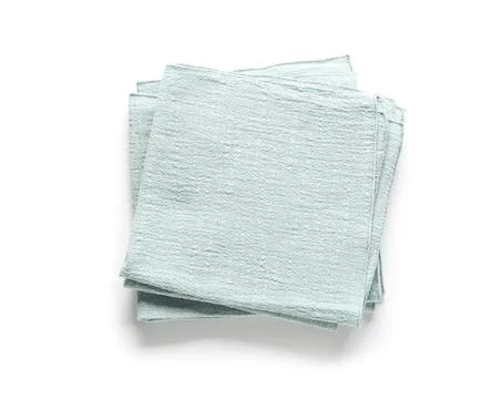 Stack of folded light blue kitchen towels or napkins with textured fabric, is Stock Photos