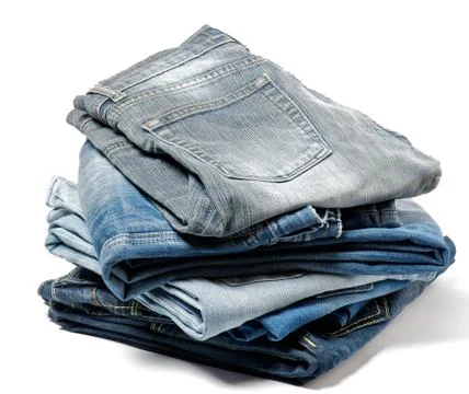 Stack of Folded Old Jeans Stock Photos