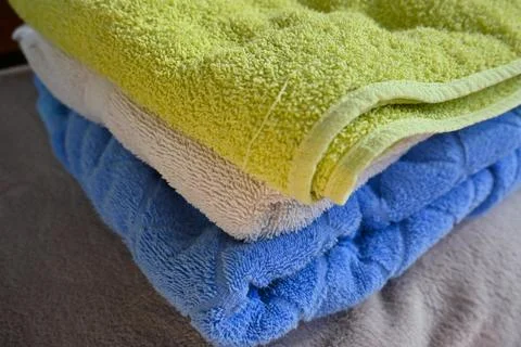 Stack of folded terry towels Photos