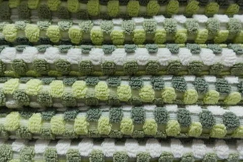 Stack of folded towels close-up on the shelf Stock Photos