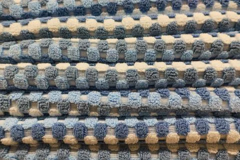 Stack of folded towels close-up on the shelf Stock Photos