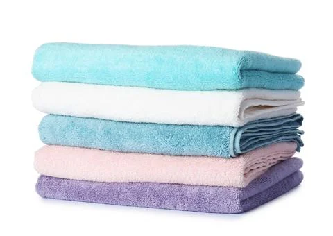 Stack of folded towels on white background Stock Photos