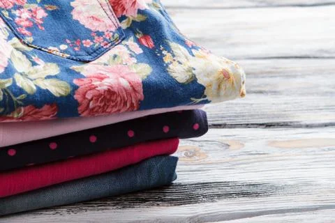 Stack of folded trousers. Stock Photos