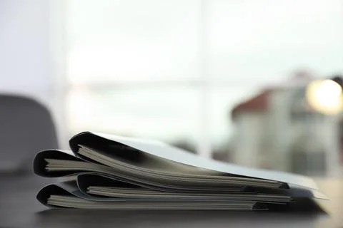 Stack of folders with documents on office table. Space for text Stock Photos