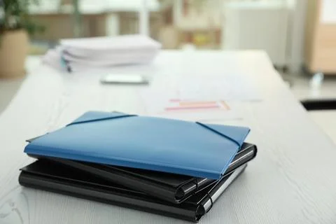 Stack of folders with documents on office table. Space for text Stock Photos
