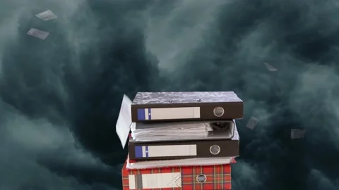 A stack of folders with judge's gavel against a background of thunderclouds Stock Footage 236479241