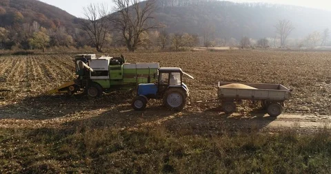 Stack of footage: Aerial view of combine harvester working. 4k 動画素材 116491024