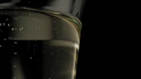 STACK OF FOOTAGE: Champagne bubbles going up in super slow motion Stockbeeldmateriaal 149840398
