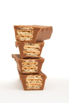 Stack of Four chocolate waffles isolated on white background Stock Photos