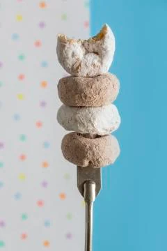 Stack of four Donuts on Fork Stock Photos